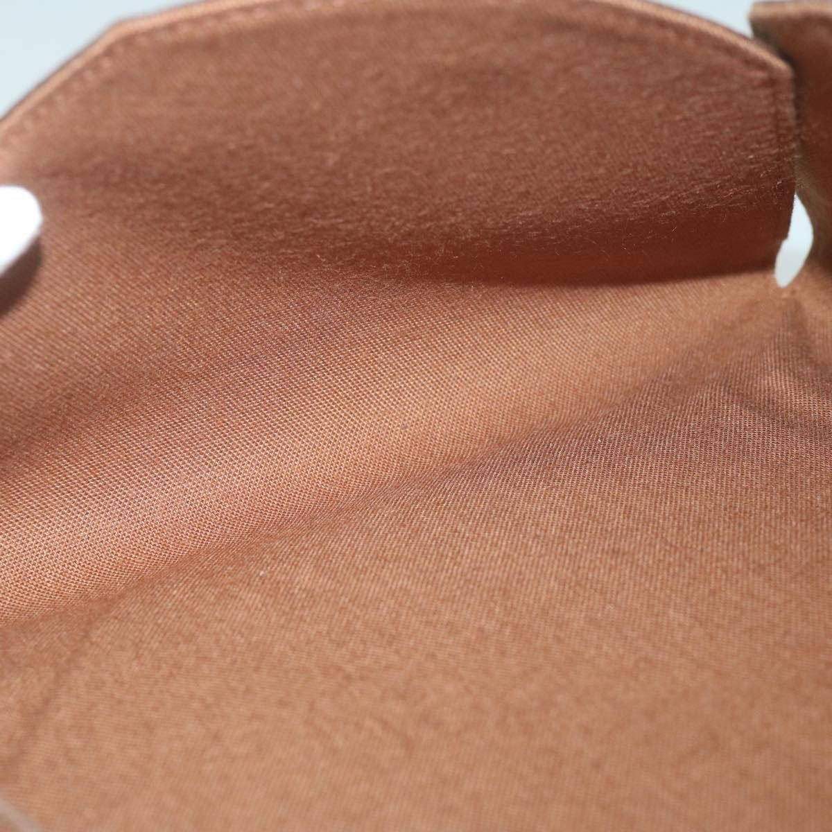 Louis Vuitton Louis Vuitton Kirigami Pochette Monogram Canvas GM Bruin