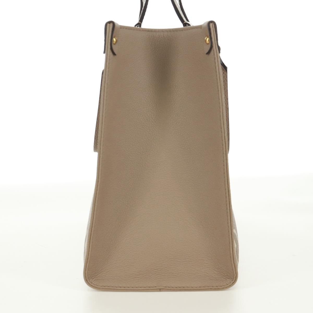 Louis Vuitton Louis Vuitton OnTheGo Tote Bicolor Monogram Empreinte Giant PM Grijs