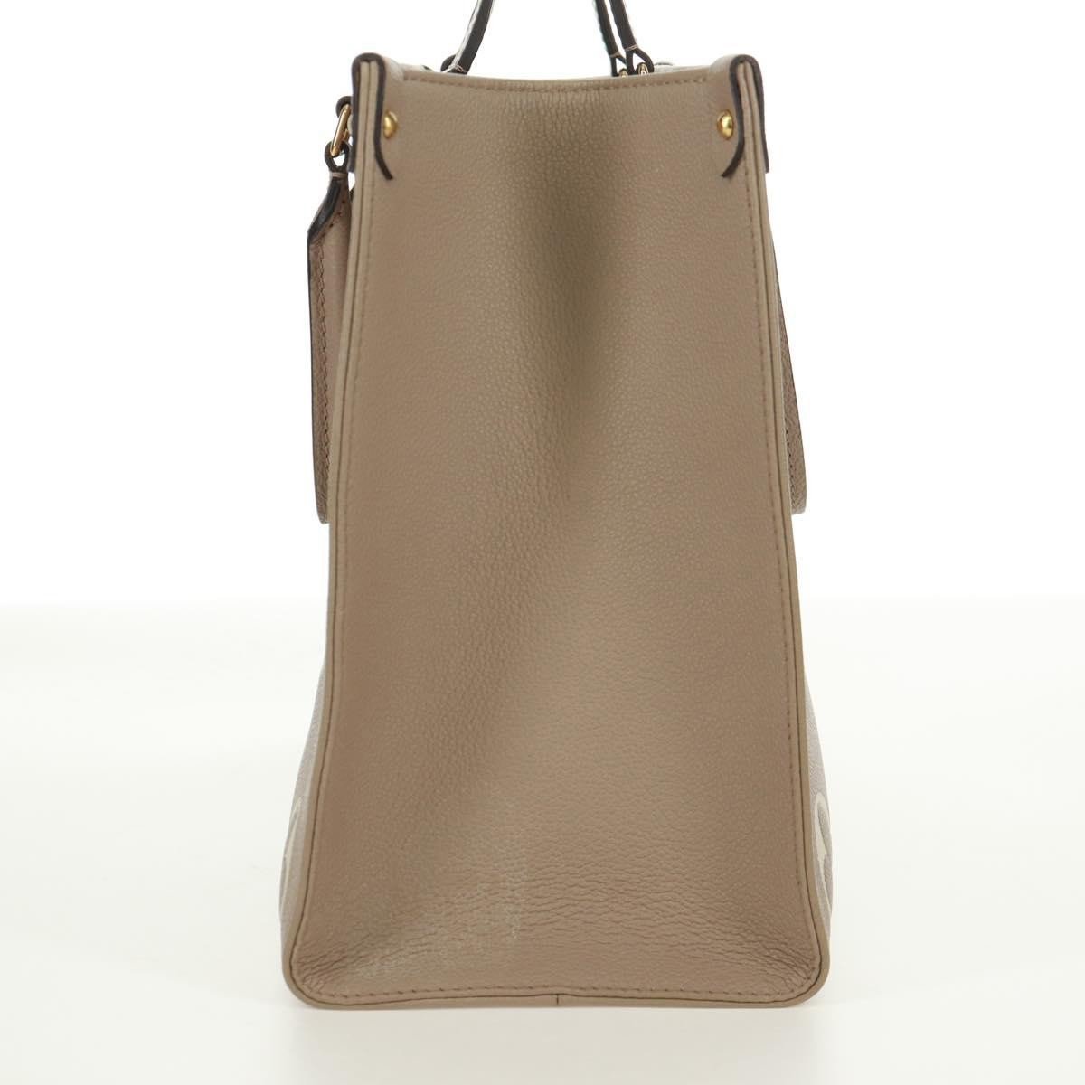 Louis Vuitton Louis Vuitton OnTheGo Tote Bicolor Monogram Empreinte Giant PM Grijs