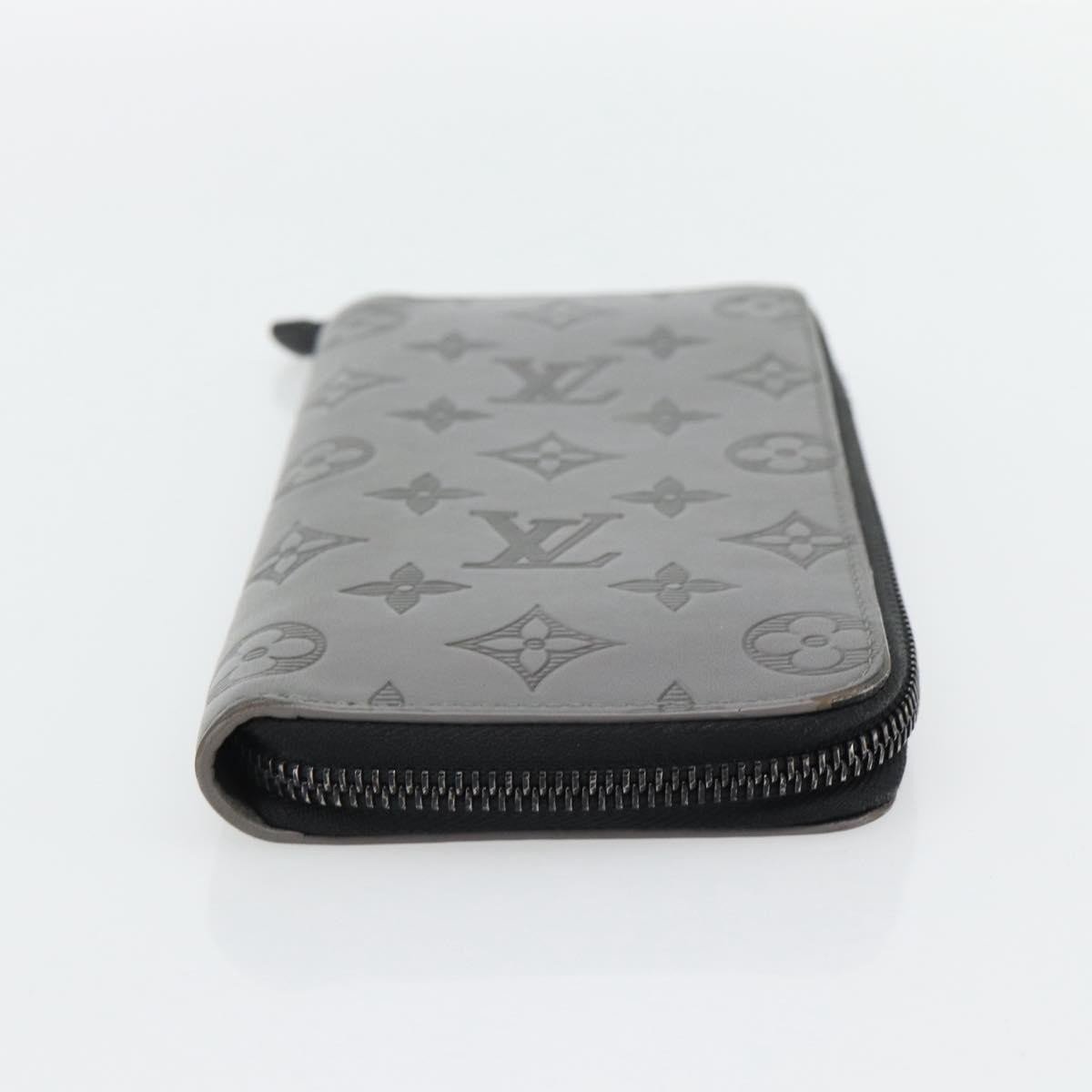 Louis Vuitton Zippy Wallet Vertical Monogram Shadow Leather Grijs