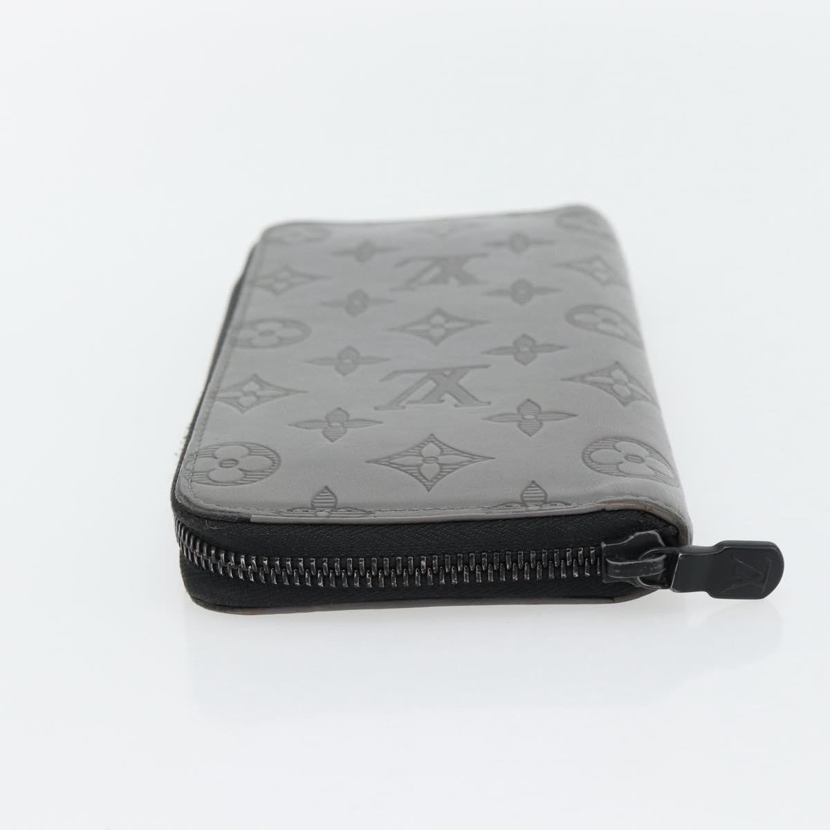 Louis Vuitton Zippy Wallet Vertical Monogram Shadow Leather Grijs