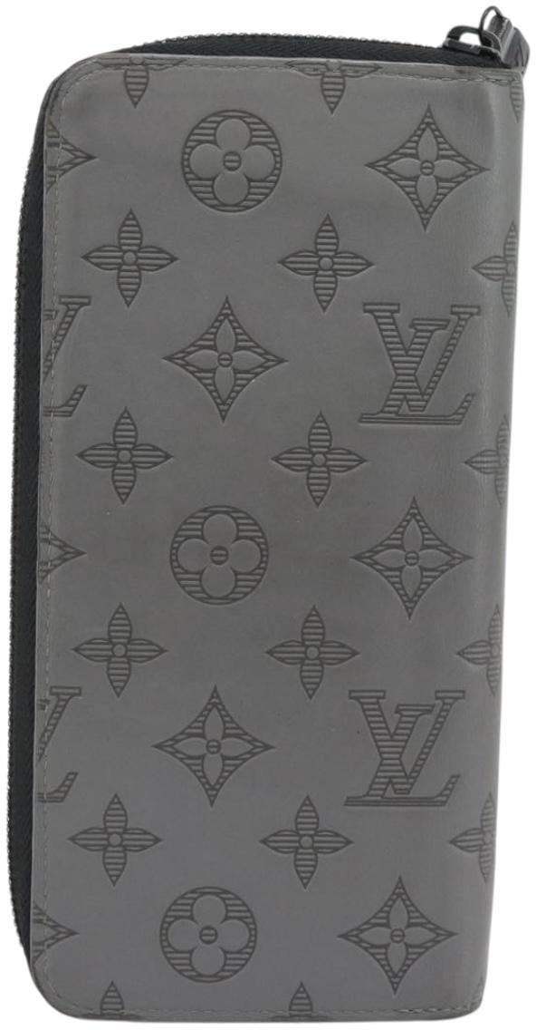 Louis Vuitton Zippy Wallet Vertical Monogram Shadow Leather Grijs