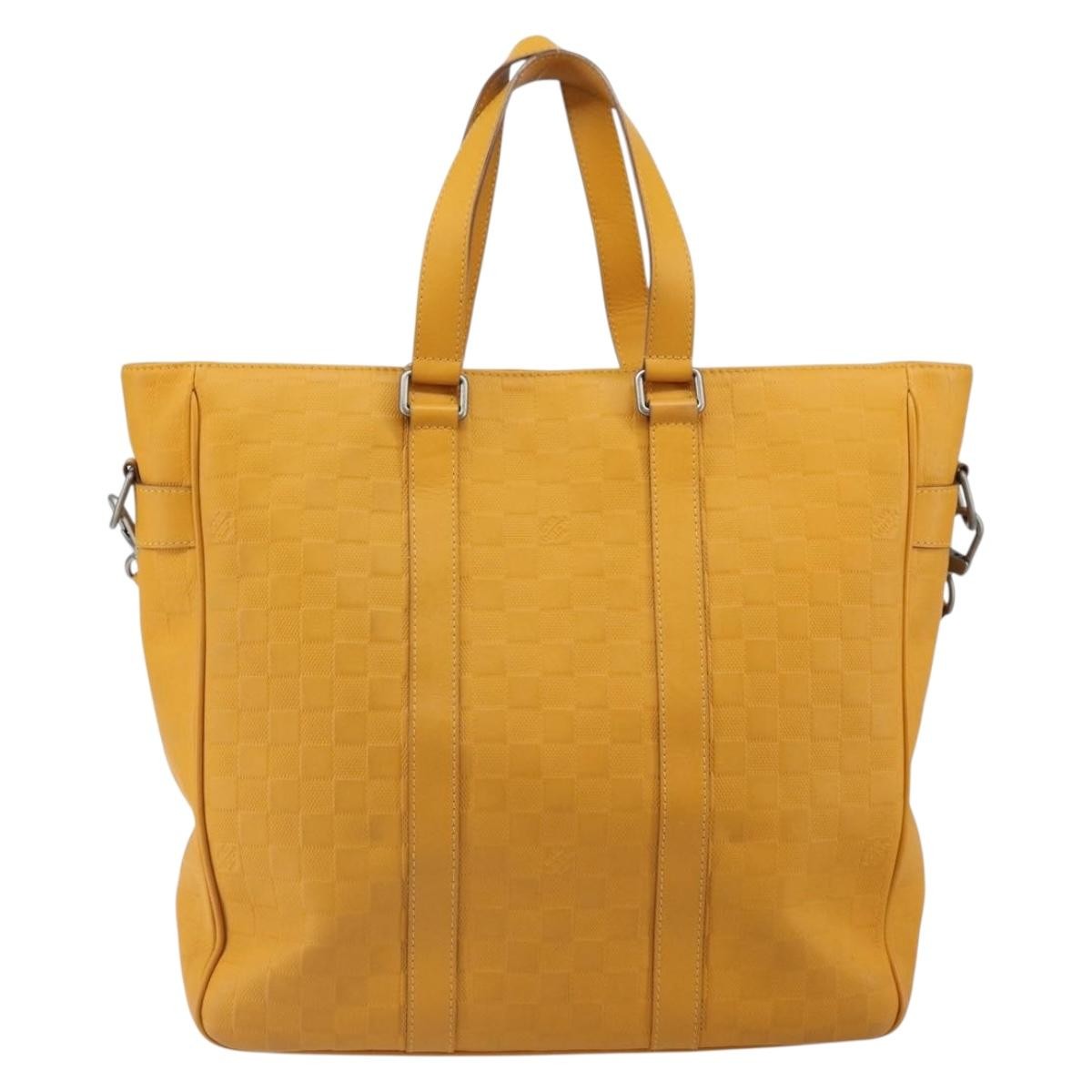 Louis Vuitton Louis Vuitton Tadao Handbag Damier Infini Leather MM Geel