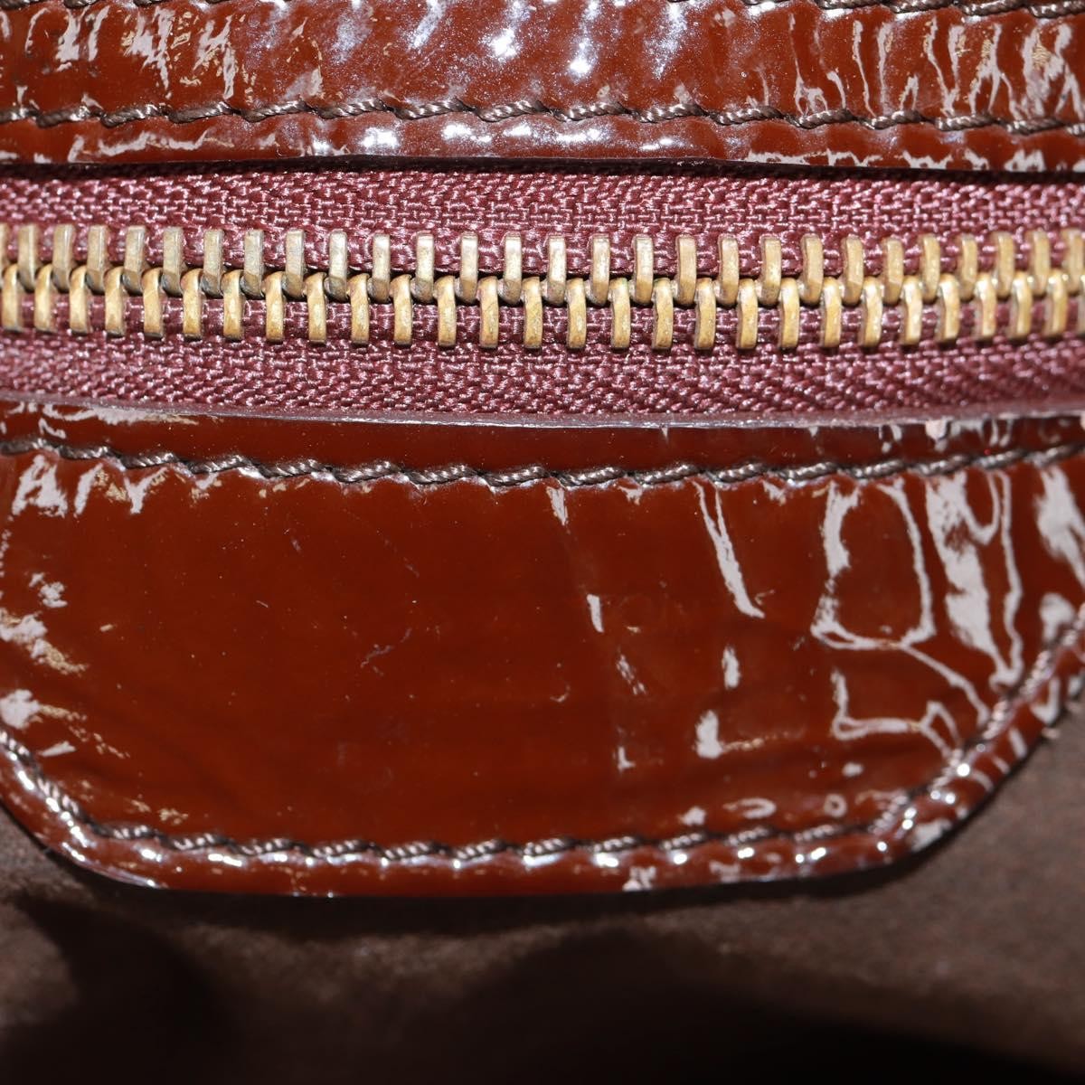 Louis Vuitton Louis Vuitton L Hobo Surya Leather Bruin