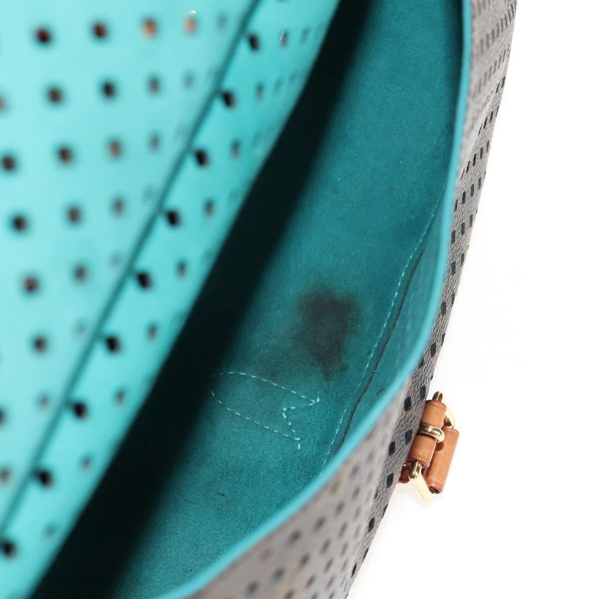 Louis Vuitton Louis Vuitton Flore Saumur Handbag Perforated Monogram Canvas Bruin