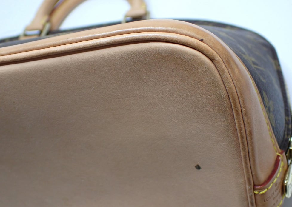 Louis Vuitton Alma Monogram Canvas PM Bruin