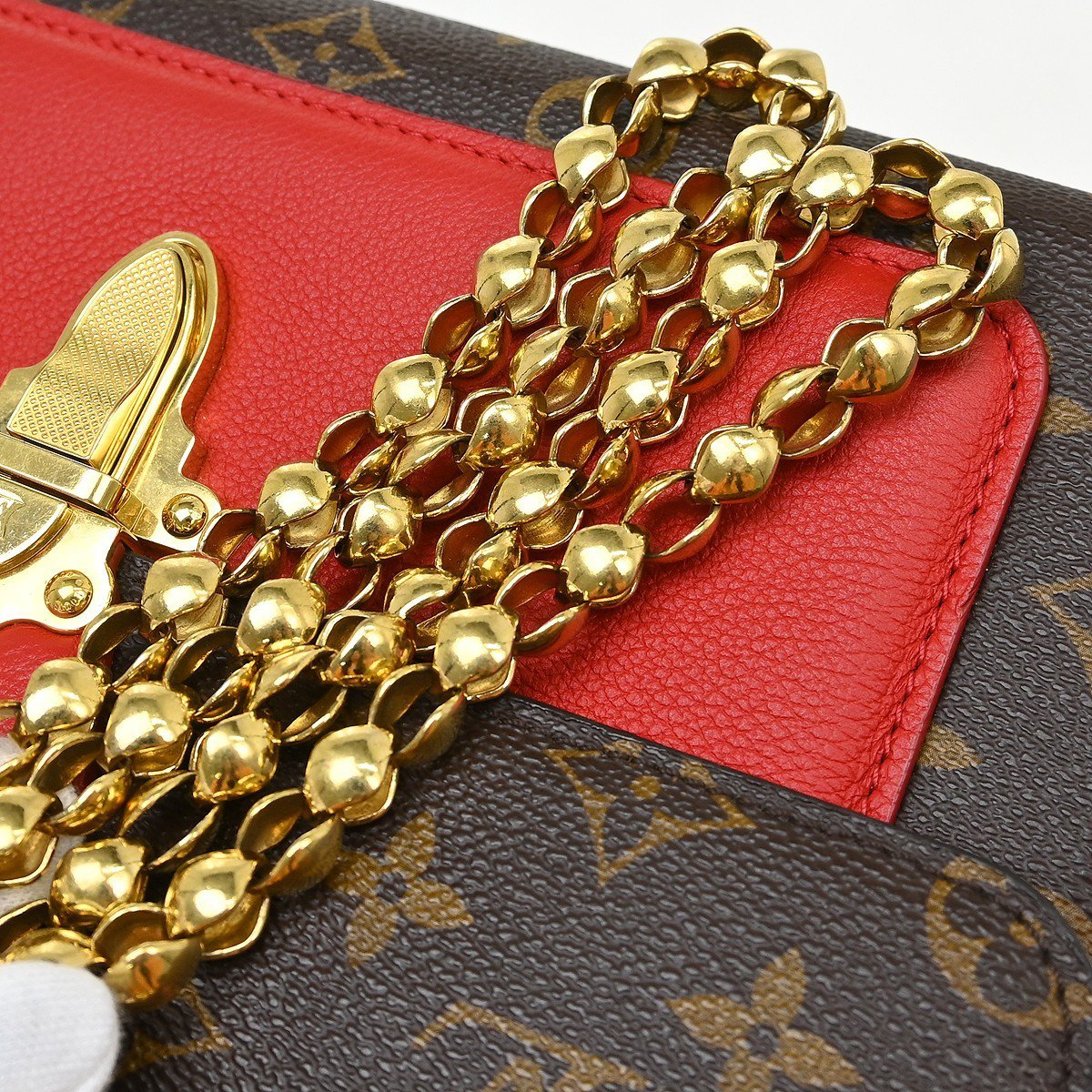 Louis Vuitton Victoire Handbag Monogram Canvas and Leather Bruin