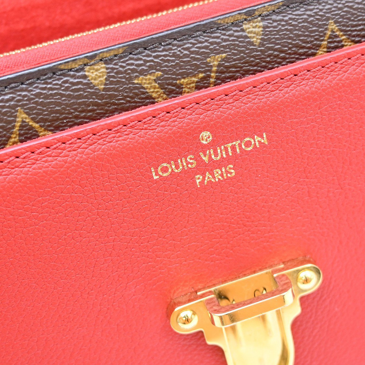 Louis Vuitton Victoire Handbag Monogram Canvas and Leather Bruin