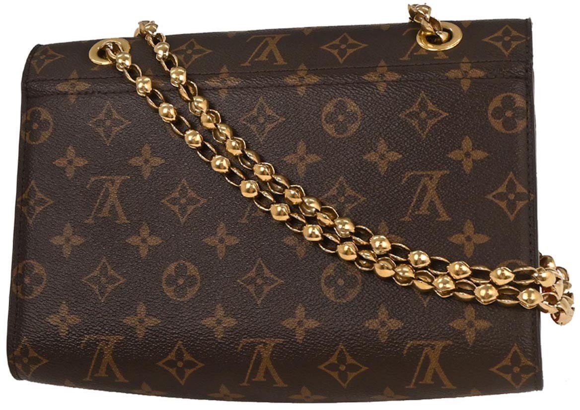 Louis Vuitton Louis Vuitton Victoire Handbag Monogram Canvas and Leather Bruin