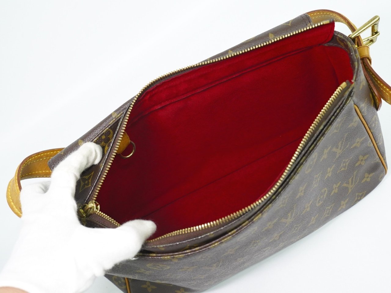 Louis Vuitton Louis Vuitton Viva Cite Handbag Monogram Canvas GM Bruin