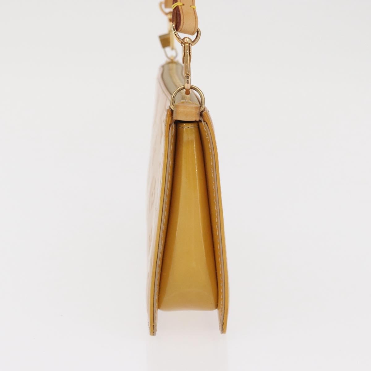 Louis Vuitton Lexington Pochette Patent Leather Geel