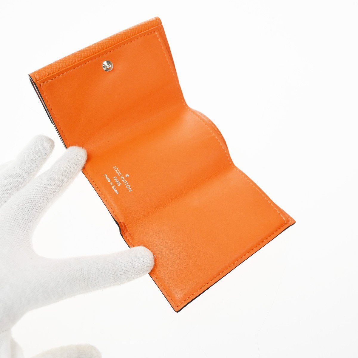 Louis Vuitton Discovery Monogram Taigarama Compact Oranje