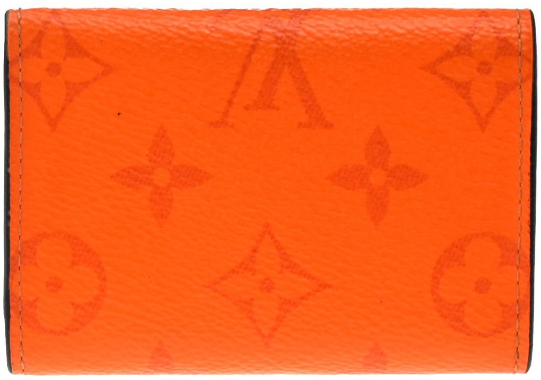 Louis Vuitton Discovery Monogram Taigarama Compact Oranje