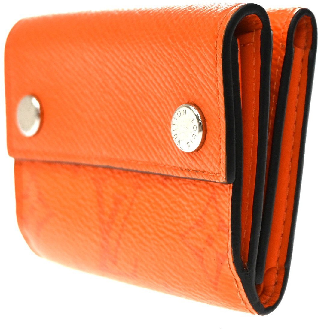 Louis Vuitton Discovery Monogram Taigarama Compact Oranje