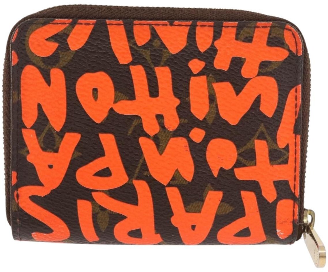 Louis Vuitton Louis Vuitton Porte-Monnaie Zippy Wallet monogramme empreinte Oranje