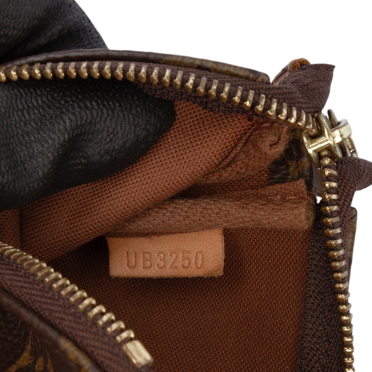 Louis Vuitton Monogram Mini Pochette Accessoires Bruin