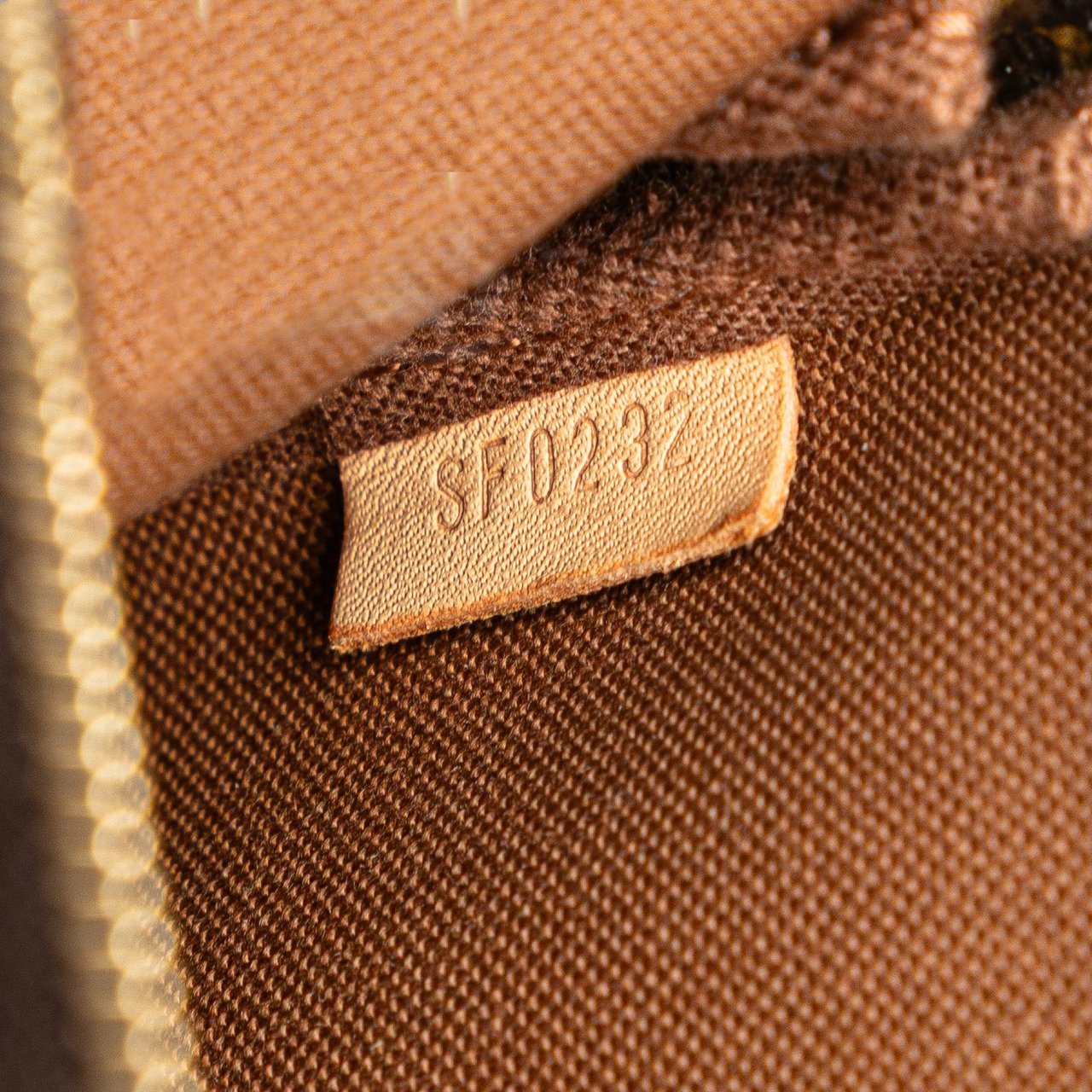 Louis Vuitton Monogram Mini Pochette Accessoires Bruin