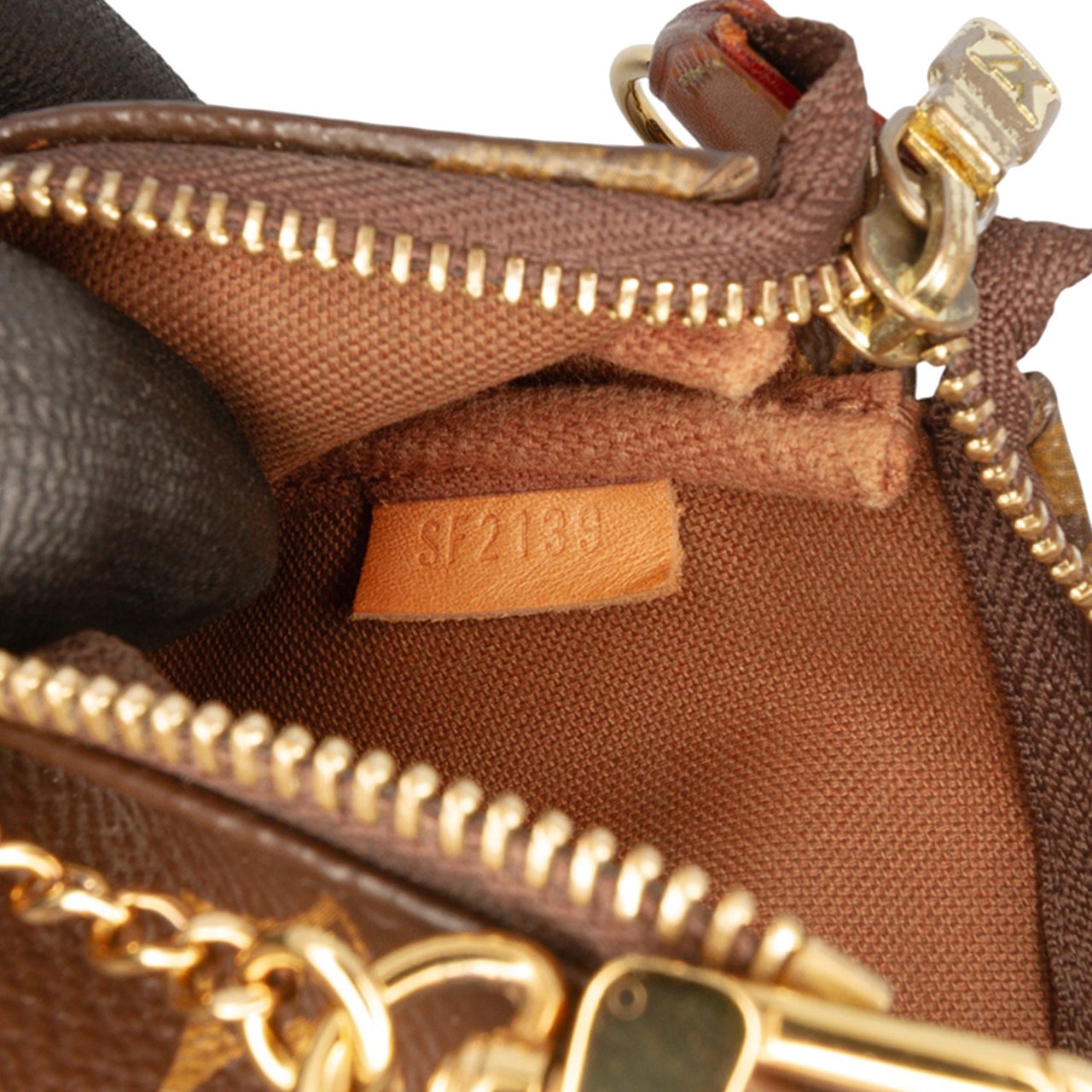 Louis Vuitton Monogram Mini Pochette Accessoires Bruin