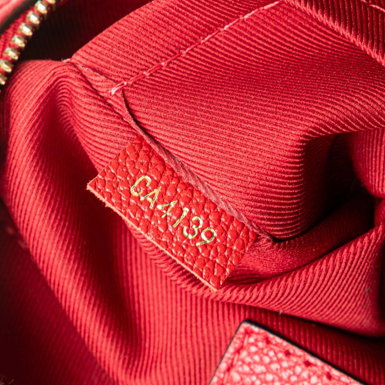 Louis Vuitton Monogram Empreinte Saintonge Rood
