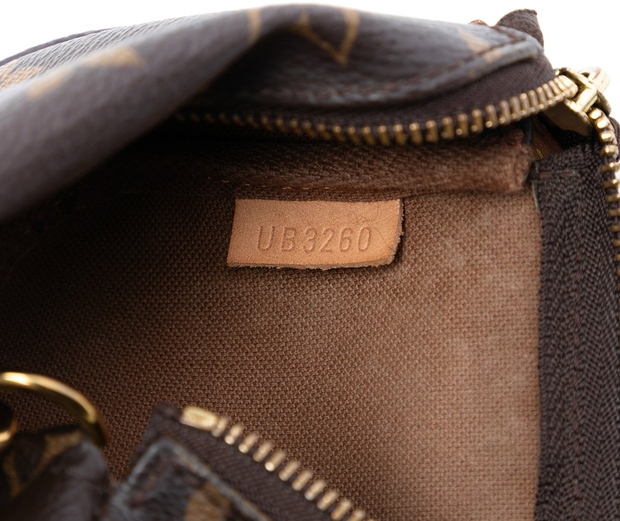 Louis Vuitton Monogram Mini Pochette Accessoires Bruin