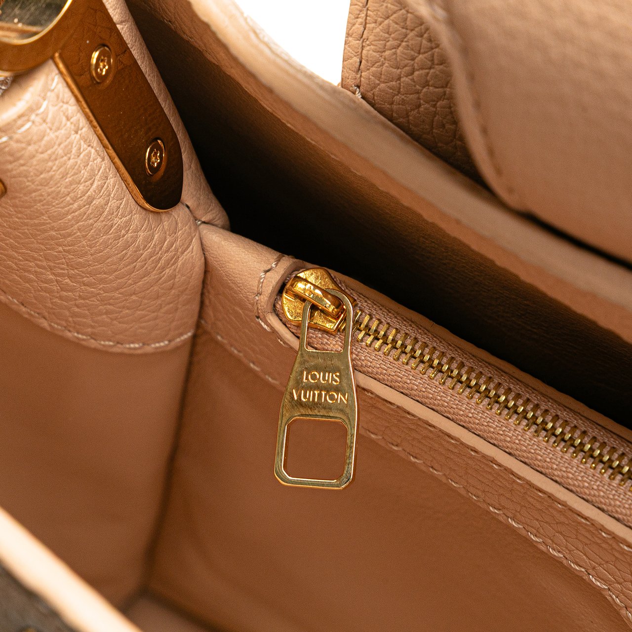 Louis Vuitton Taurillon Studdy Capucines MM Bruin