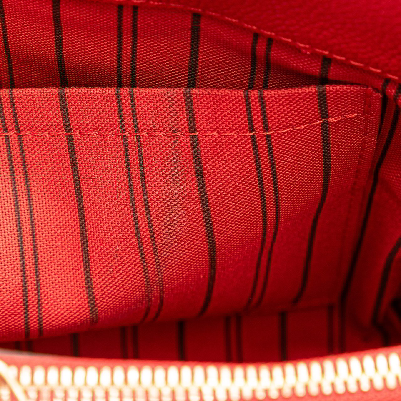Louis Vuitton Monogram Empreinte Montaigne MM Rood