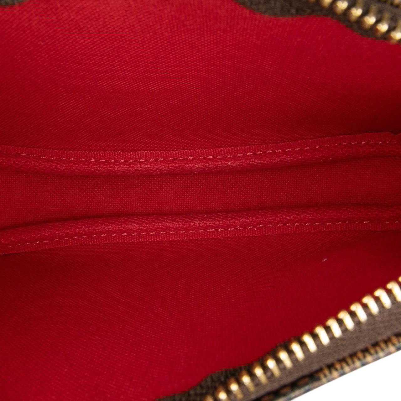 Louis Vuitton Damier Ebene Mini Pochette Accessoires Bruin