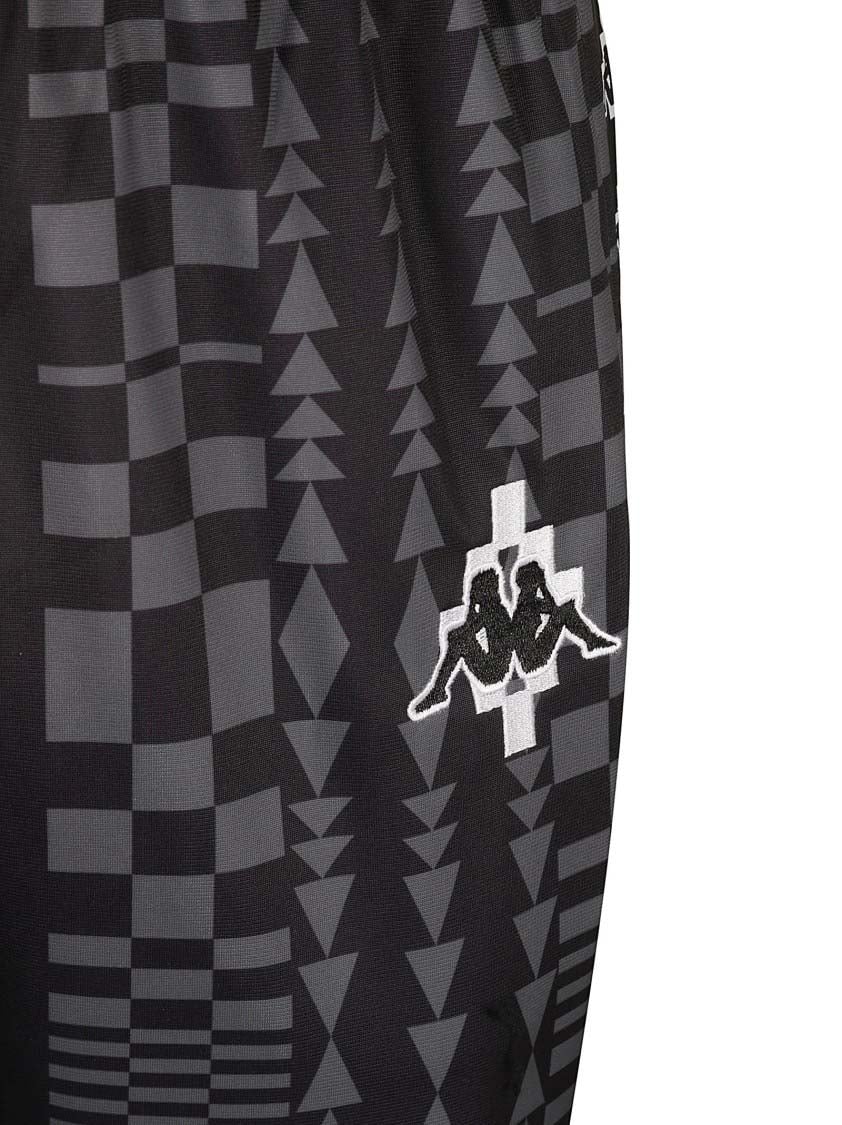 Marcelo Burlon Geometric Pattern Trousers With Tapered Legs Zwart