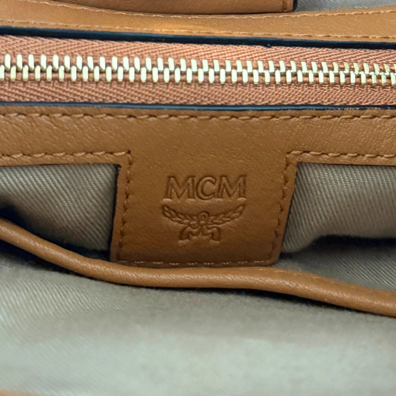 MCM Essential drawstring bag in Visetos Cognac Bruin