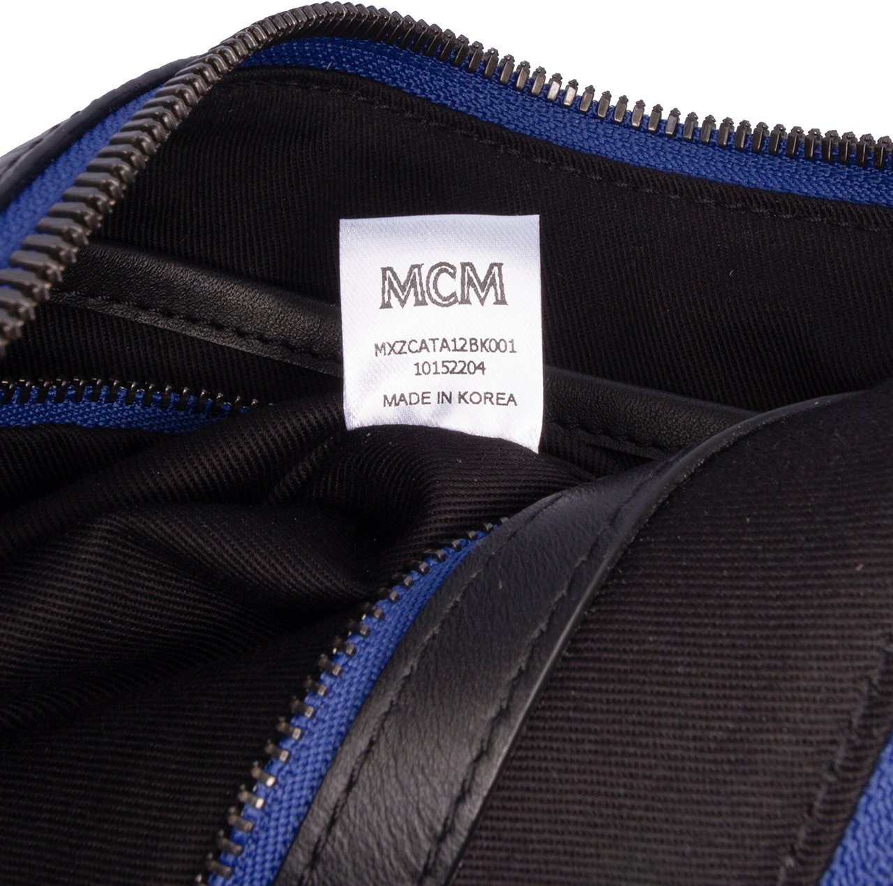 MCM Sambypen Haru Henry Kaiser Visetos Coated Canvas Clutch Zwart