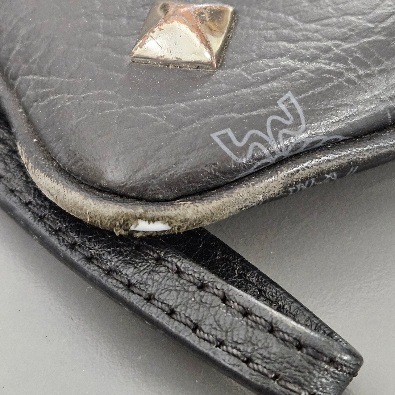 MCM MCM Monogram Studded Visetos Leather Clutch Bag Zwart