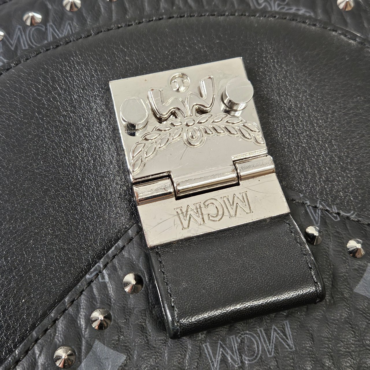 MCM Visetos Monogram Patricia Studded Saddle Crossbody Handbag Zwart