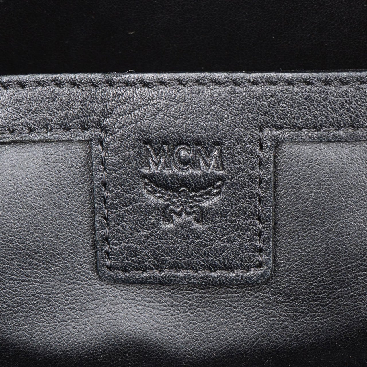 MCM Monogram Visetos Stark Side Studs Backpack Bruin