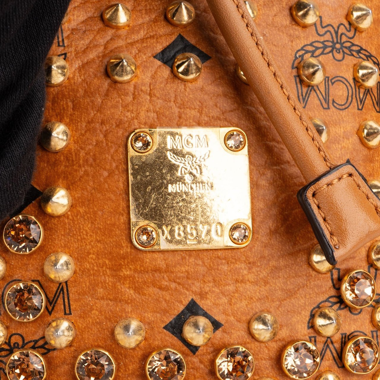MCM Monogram Visetos Studded Small Drawstring Bucket Crossbody Bag Bruin