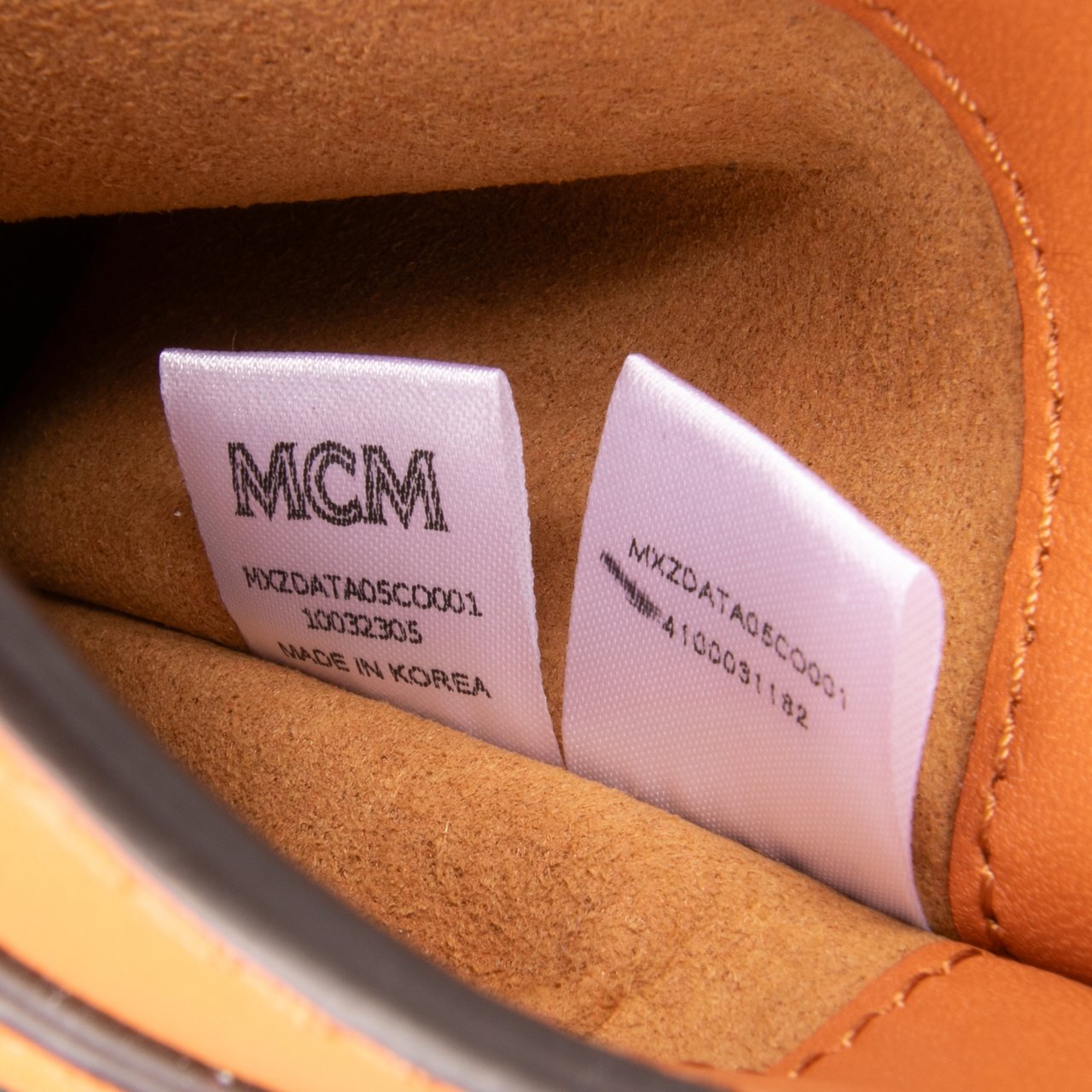 MCM Spanish Calfskin Embossed Logo Aren Lanyard Phone Case Bruin