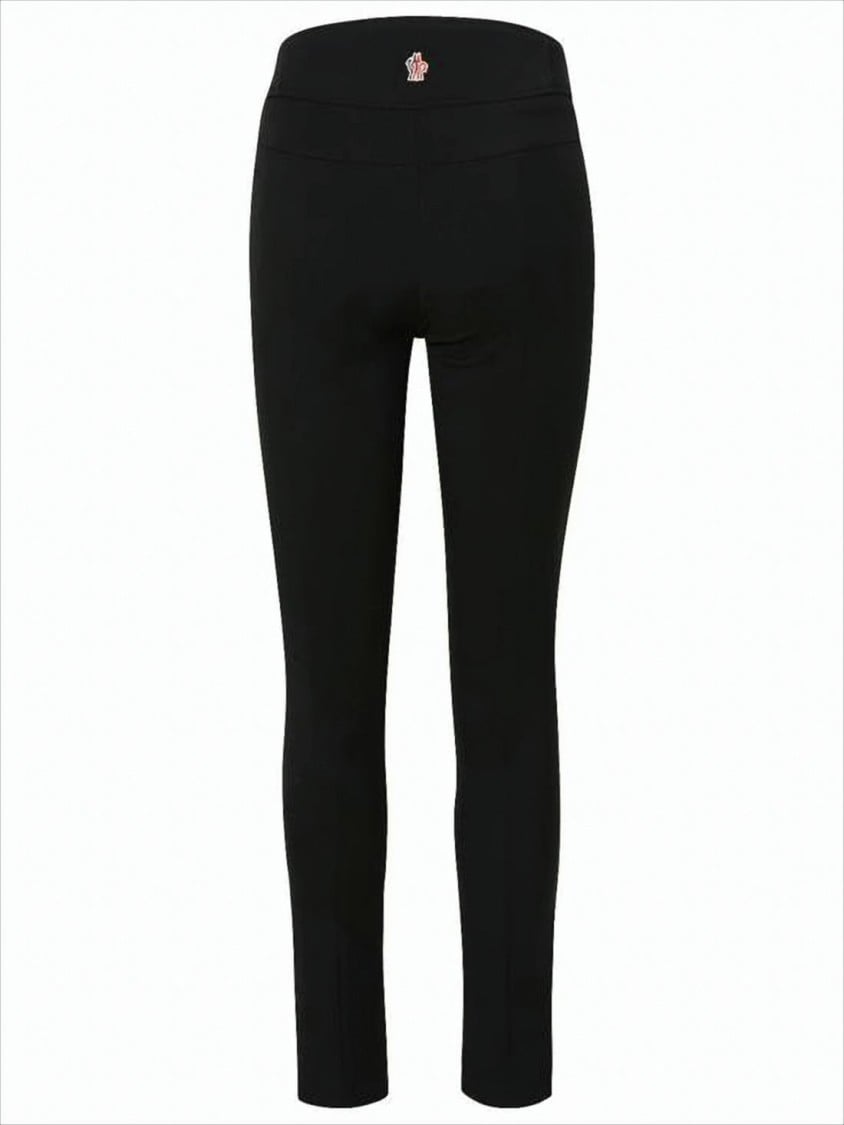 Moncler Slim Fit Pants With Logo Detail And Zippered Pockets Zwart