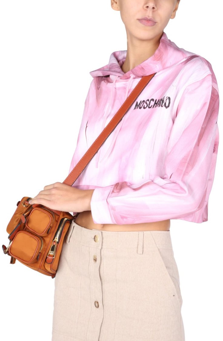 Moschino "Art Theme" Cropped Sweatshirt Neutraal