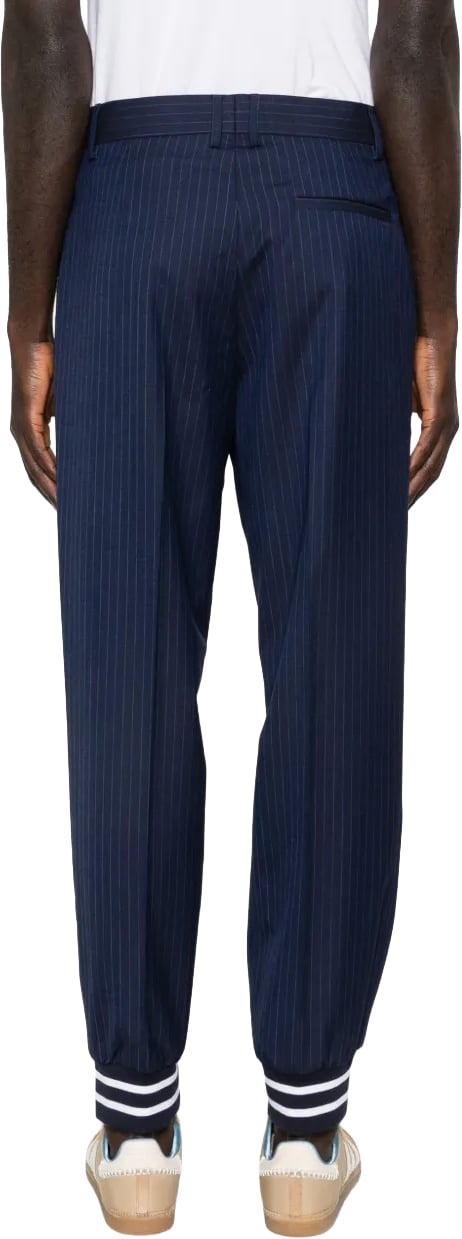 Moschino Relaxed Tapered Pants With Pinstripe Design And Elasticated Cuffs Zwart