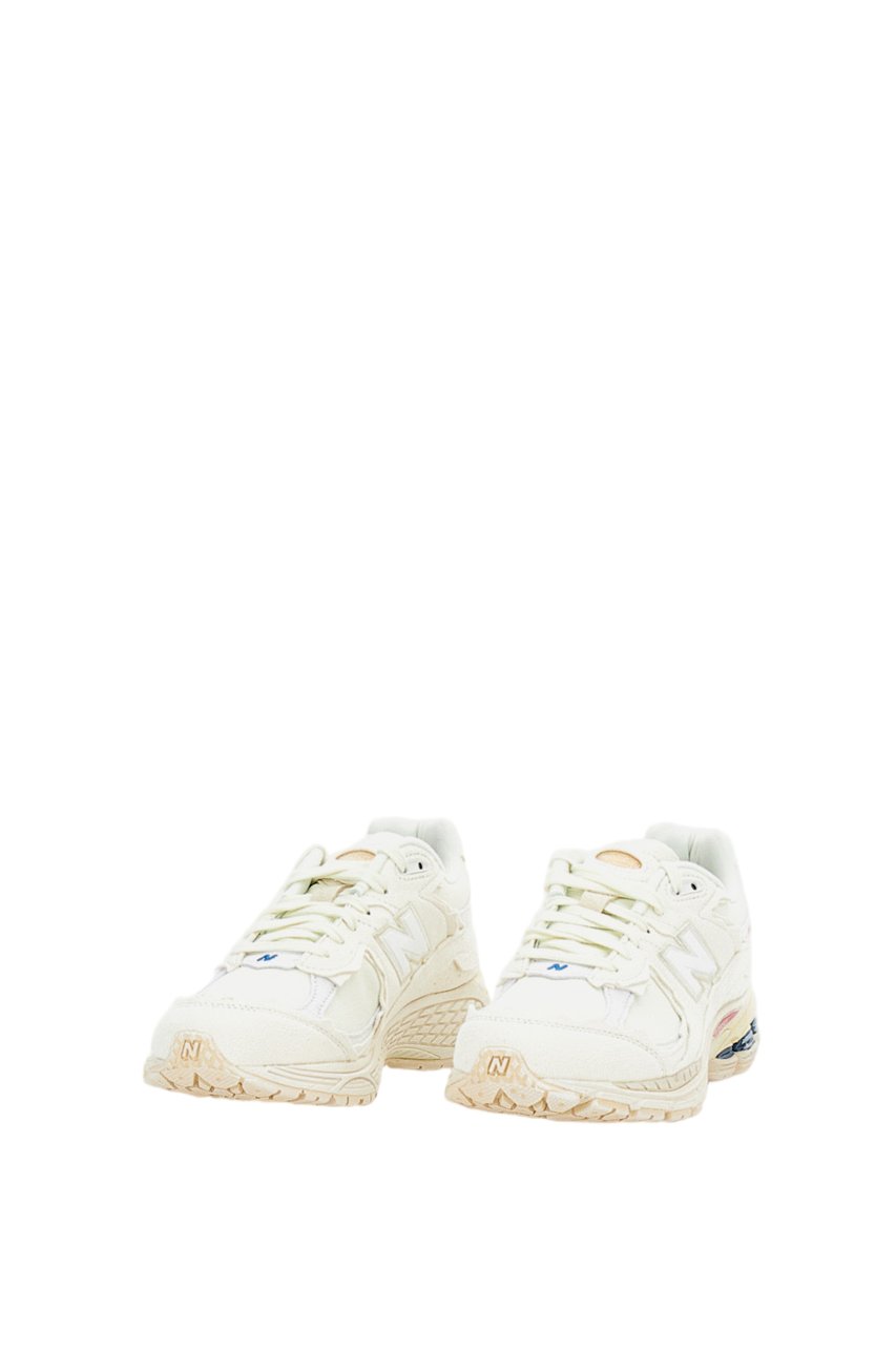 New Balance 2002R Protection Sneakers with Deconstructed Aesthetic Wit