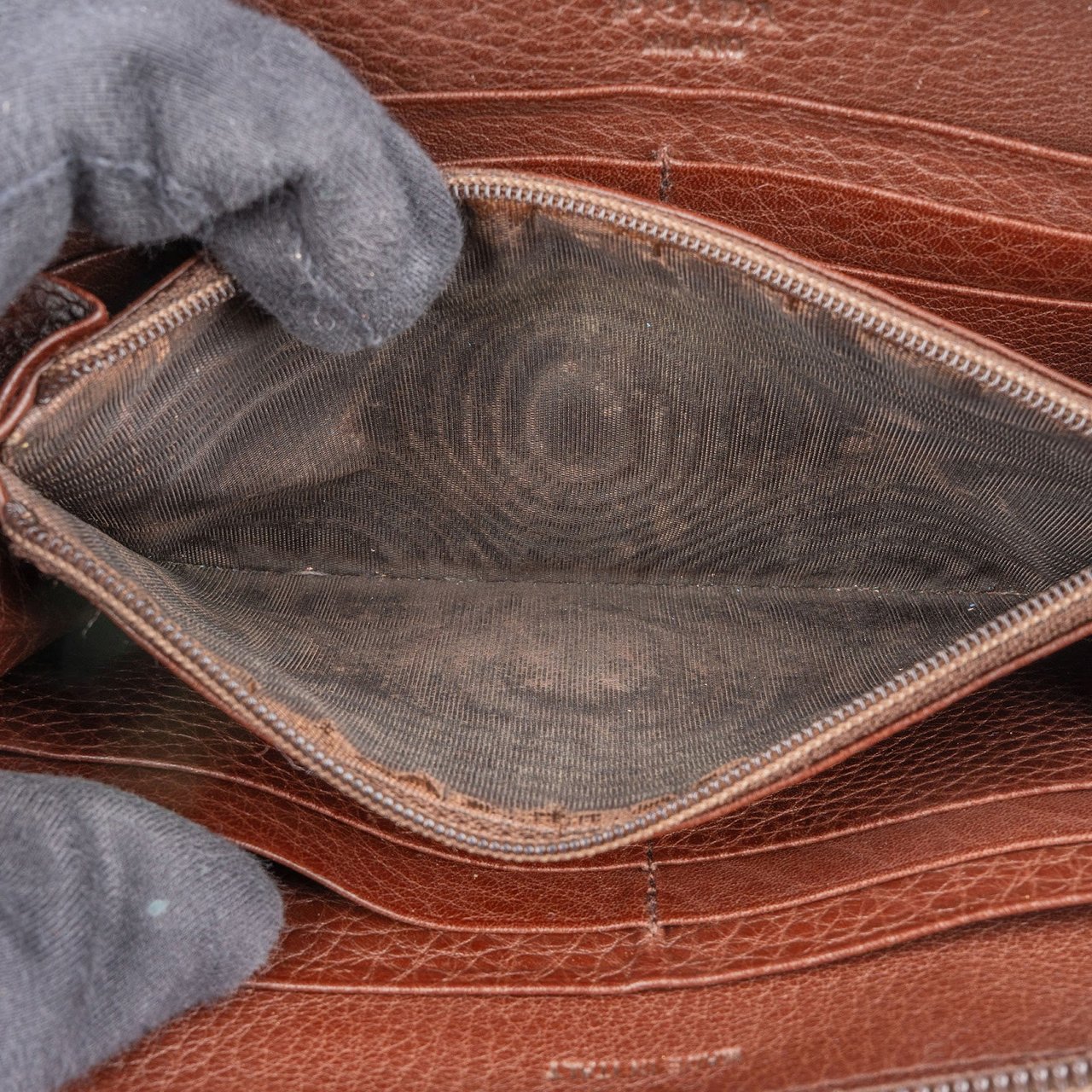 Prada Prada Pebbled Leather Zip Around Wallet Bruin