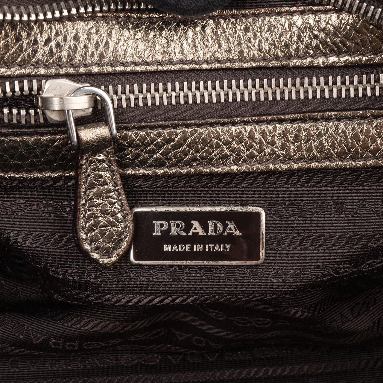 Prada Prada Metallic Pebbled Leather Bauletto Handbag Goud