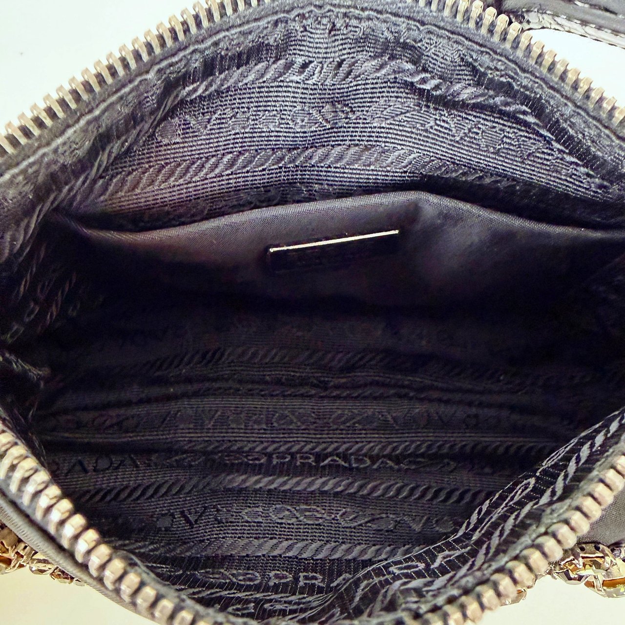 Prada Mini Bag in black nylon with rhinestone logo / very good Zwart