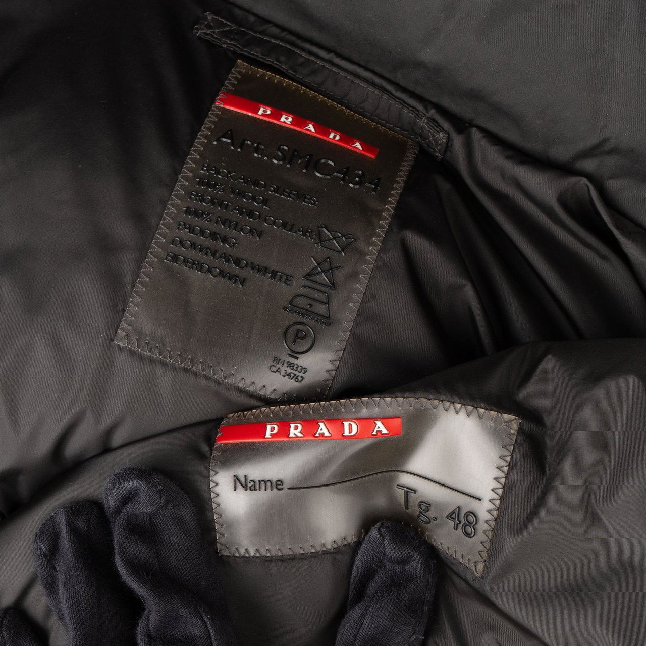 Prada Prada Wool Nylon Sports Puffer Jacket (48 / S) Zwart