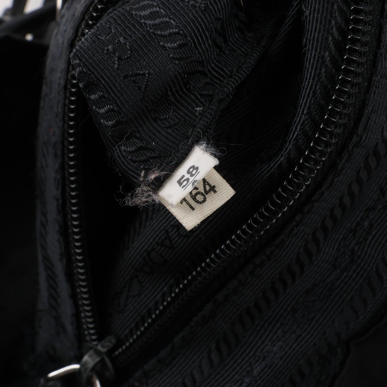 Prada Prada Tessuto Fabric x Leather Backpack in Black Zwart