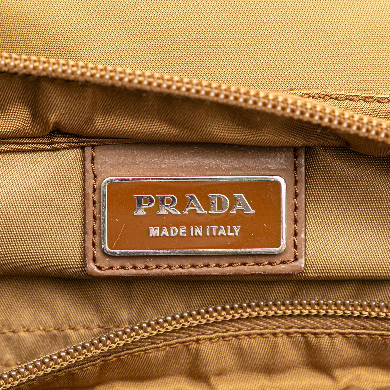 Prada Tessuto Zip Top Crossbody Bruin