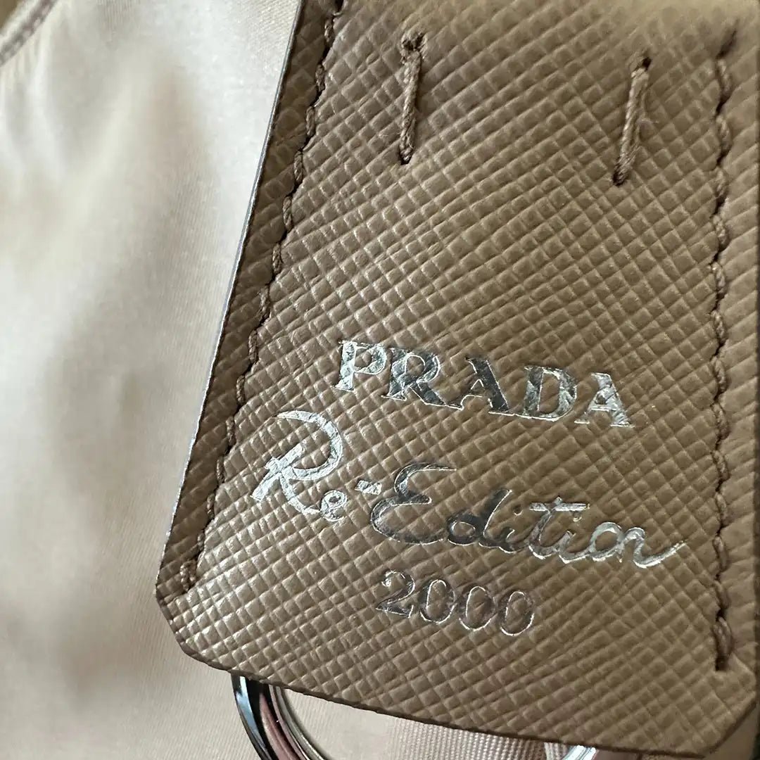 Prada Prada Re-Edition 2000 Mini Bag made of Re-Nylon beige / very good Beige
