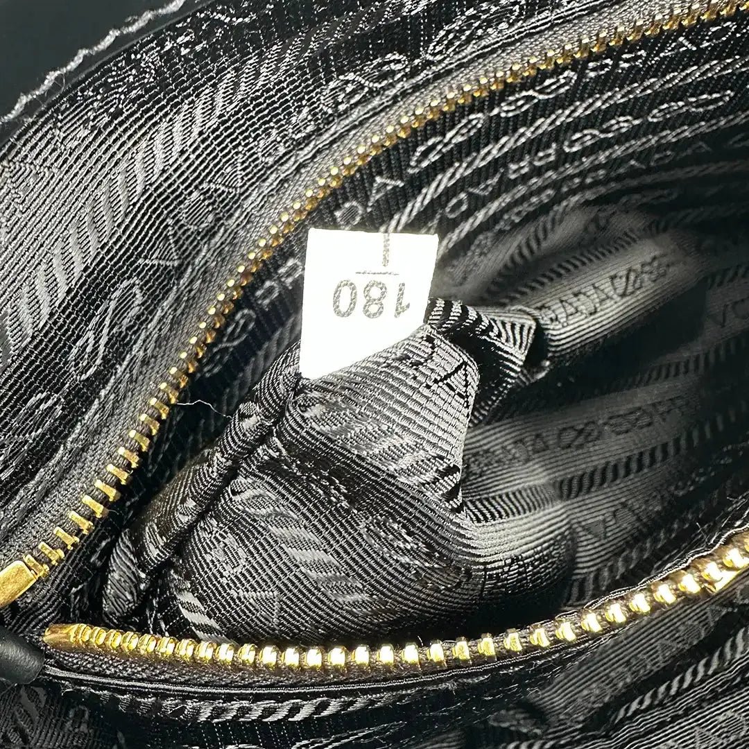 Prada Prada medium-sized handle bag made of Re-Nylon and leather / unworn Zwart