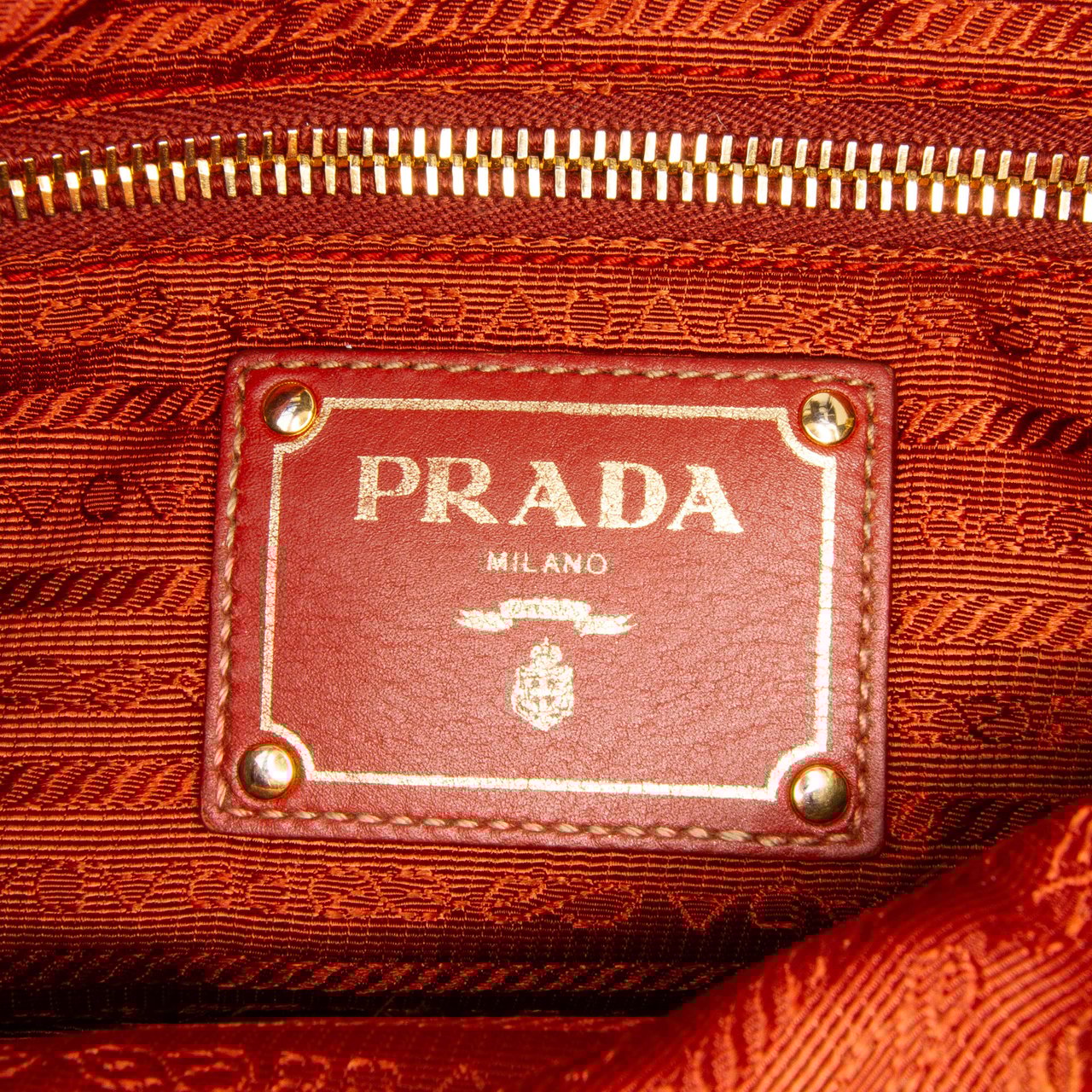 Prada Tessuto Zip Double Buckle Messenger Bag Oranje