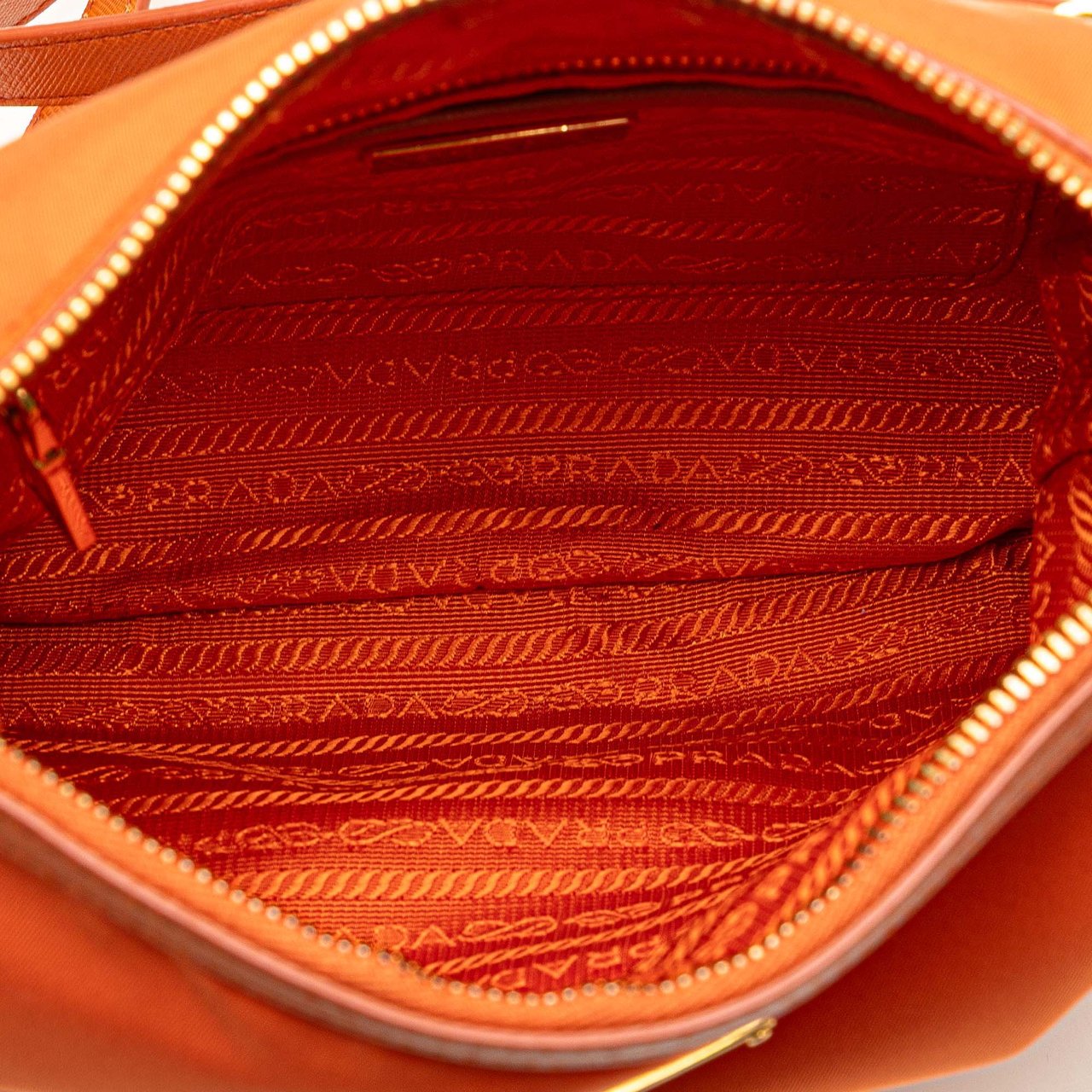 Prada Saffiano Trimmed Tessuto Zip Top Crossbody Oranje