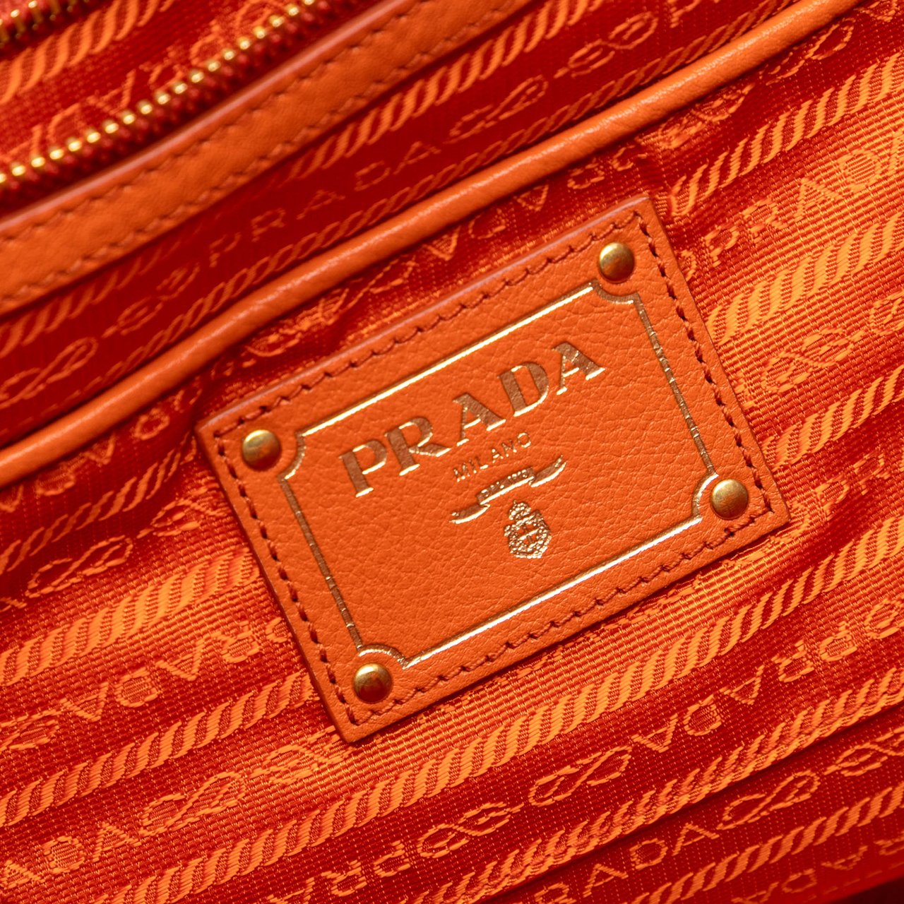Prada Vitello Daino Side Zip Convertible Tote Oranje